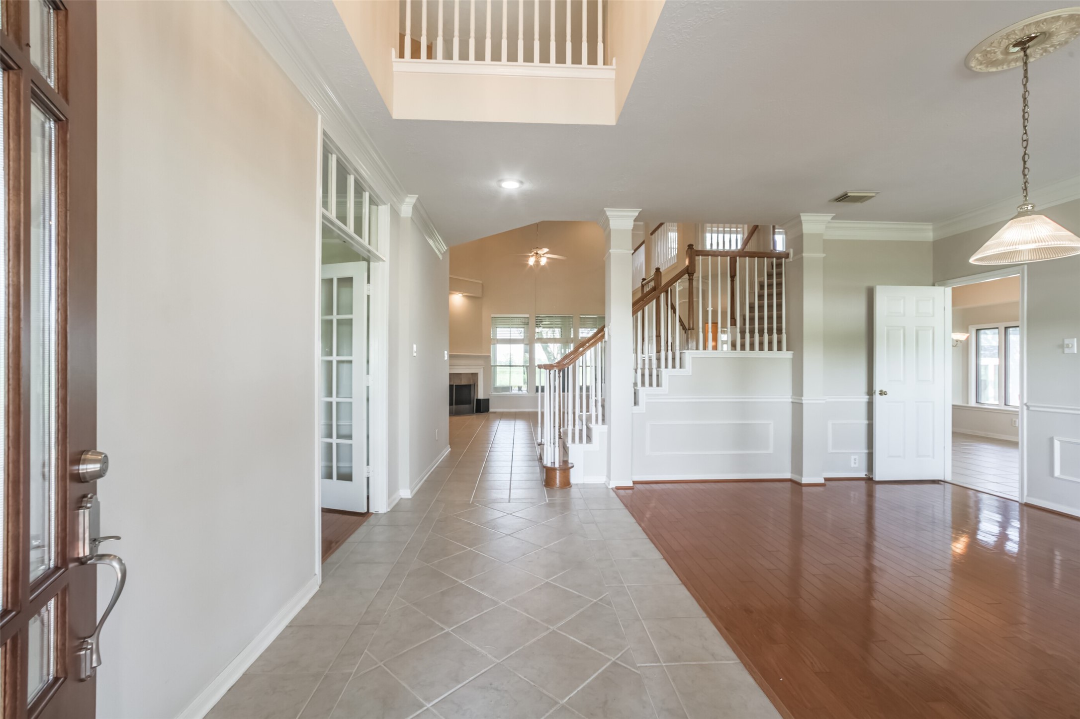 4903 Bowser Road Fulshear, TX 77441 - Photo 8 of 50 a view of a hallway with dining area