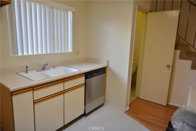a bathroom with a sink a mirror and a shower