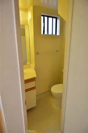 a bathroom with a sink and toilet