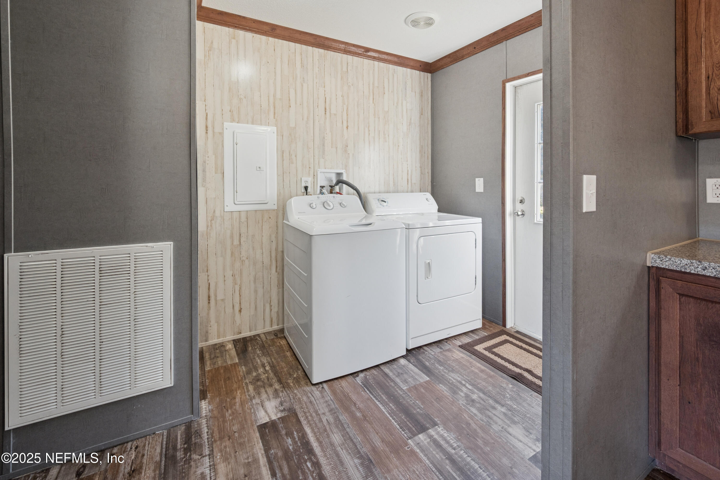 10379 Southwest 45th Place Lake Butler, FL 32054 - Photo 11 of 24 a view of utility room with washer and dryer