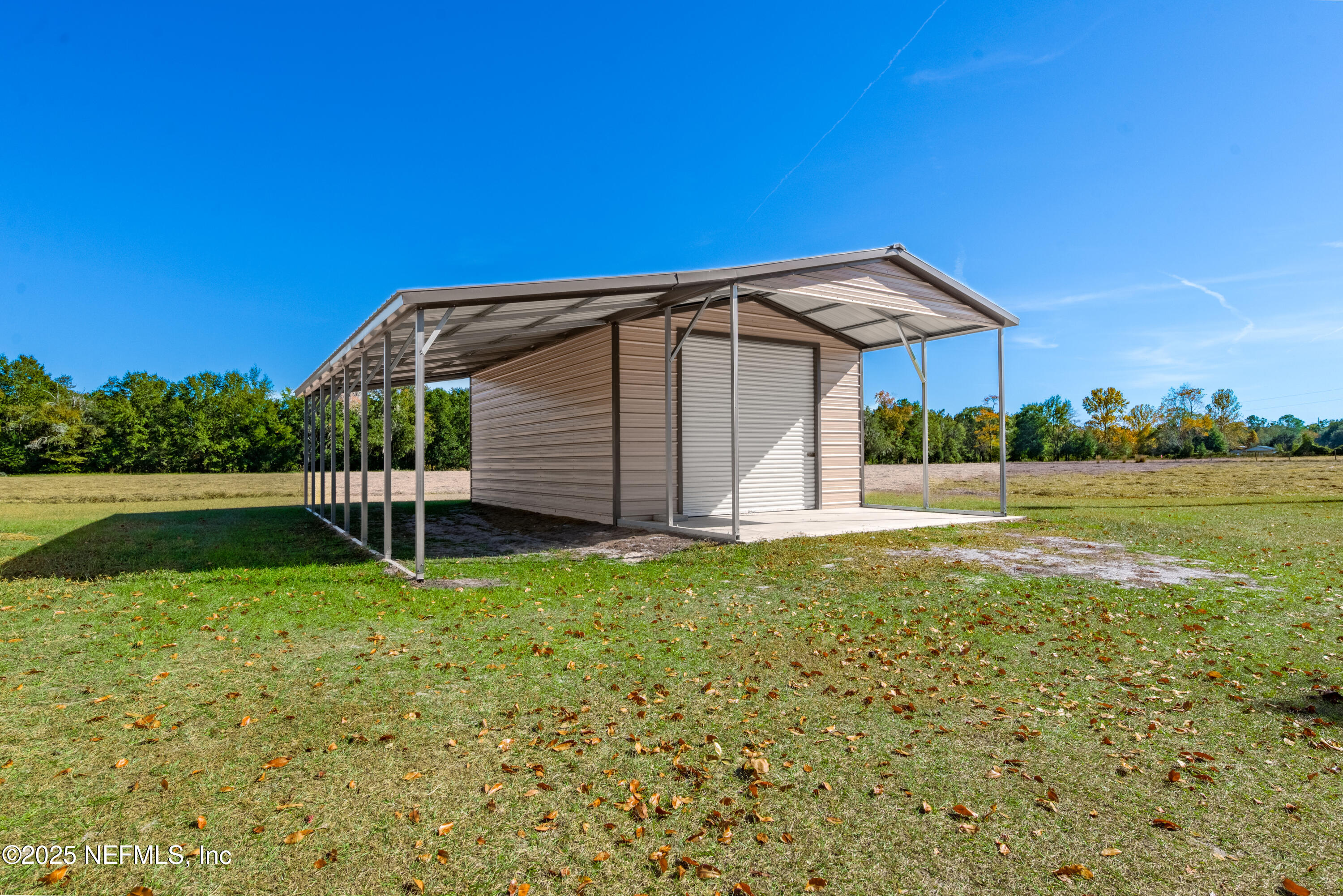 10379 Southwest 45th Place Lake Butler, FL 32054 - Photo 19 of 24 a view of a house with a backyard