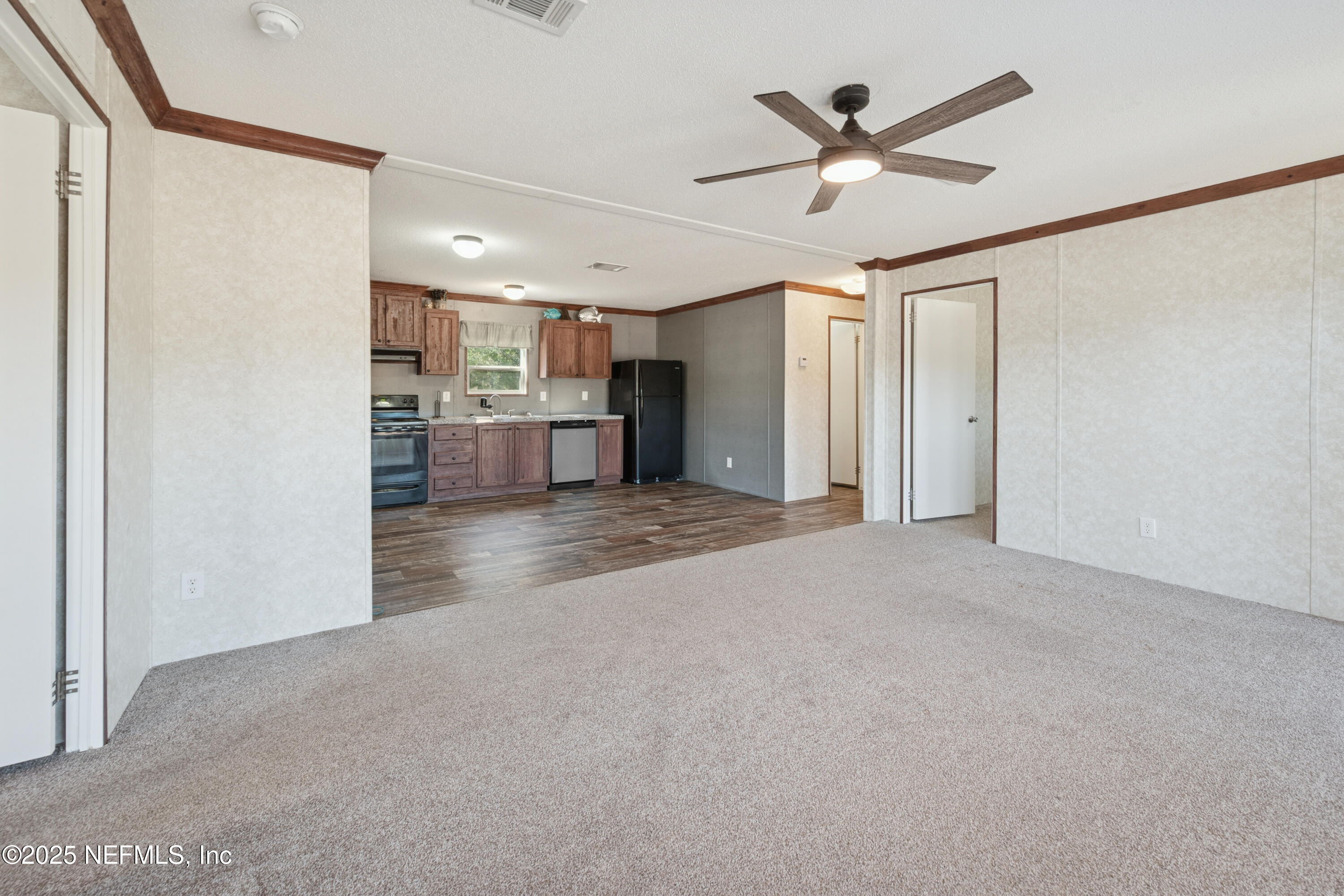 10379 Southwest 45th Place Lake Butler, FL 32054 - Photo 8 of 24 a view of empty room with a ceiling fan
