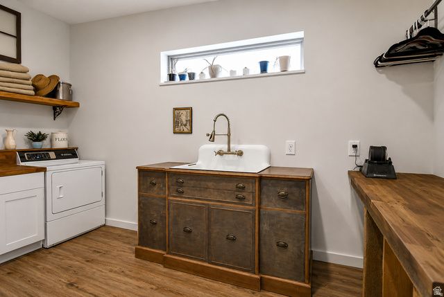 544 East 600 North, Unit 1 Joseph, UT 84739 - Photo 33 of 65 Dedicated laundry area featuring wood-finish flooring and light gray walls