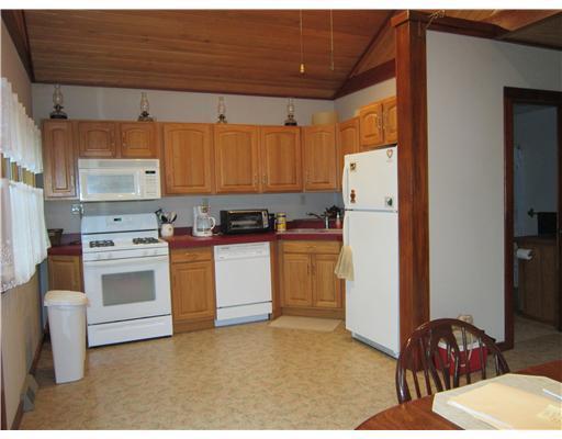 551 East Cottage Road Portage Lake, ME 04768 - Photo 13 of 18 Kitchen. Spacious kitchen with...