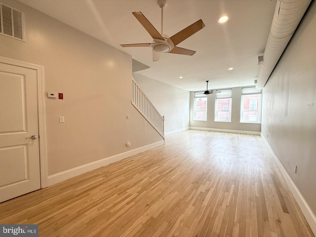 26 North 3rd Street, Unit 3 Philadelphia, PA 19106 - Photo 15 of 50 wooden floor in an empty room with a window