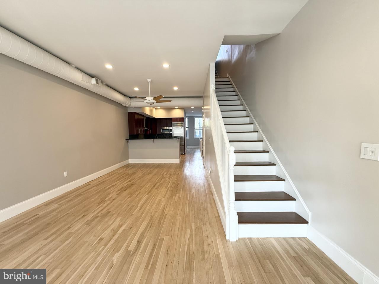 26 North 3rd Street, Unit 3 Philadelphia, PA 19106 - Photo 16 of 50 a view of a room with wooden floor and stairs