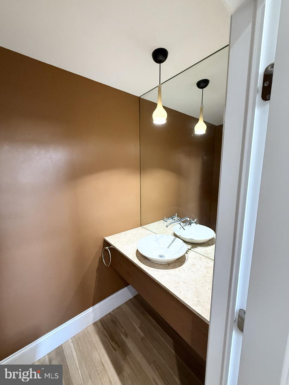 26 North 3rd Street, Unit 3 Philadelphia, PA 19106 - Photo 4 of 50 a bathroom with a sink a mirror and vanity