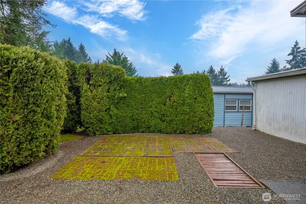 a view of backyard with outdoor space
