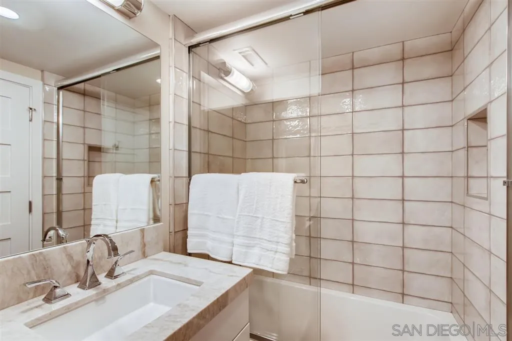 1765 Tattenham Road Encinitas, CA 92024 - Photo 12 of 25 a bathroom with a sink and a shower