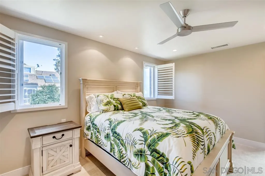1765 Tattenham Road Encinitas, CA 92024 - Photo 15 of 25 a bedroom with a bed and a window