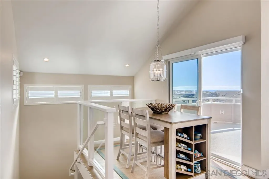 1765 Tattenham Road Encinitas, CA 92024 - Photo 16 of 25 a kitchen with stainless steel appliances kitchen island granite countertop a refrigerator and a sink