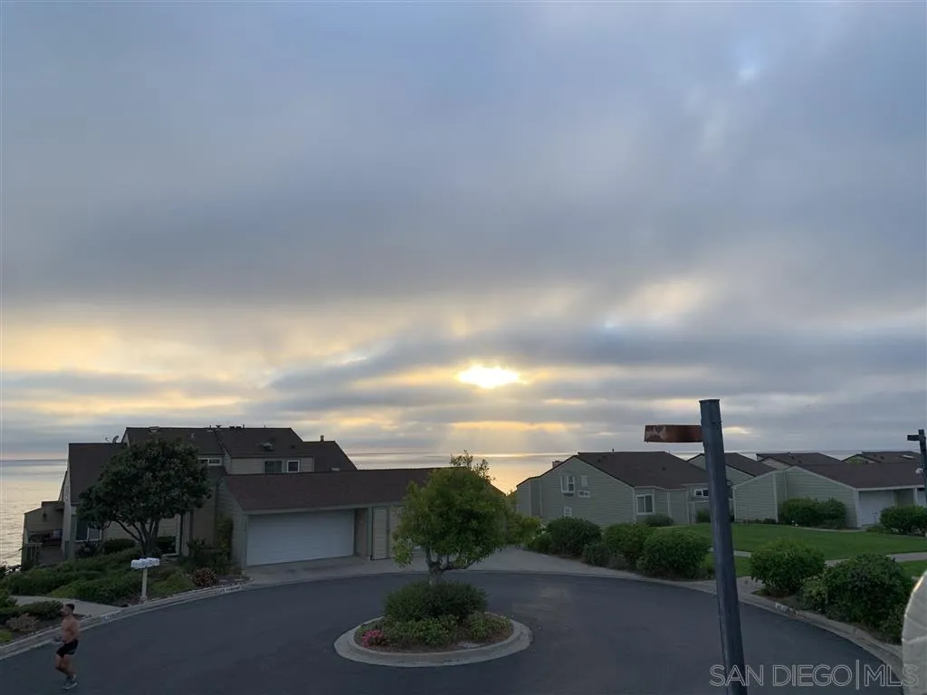 1765 Tattenham Road Encinitas, CA 92024 - Photo 23 of 25 a view of a street with a building in the background