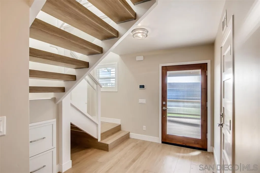 1765 Tattenham Road Encinitas, CA 92024 - Photo 4 of 25 a view of entryway and hall with wooden floor