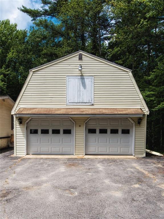 153 Lebanon Road Shapleigh, ME 04076 - Photo 3 of 25 Extra storage above the garage.