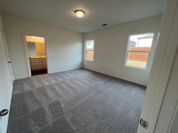 a view of a kitchen with a sink
