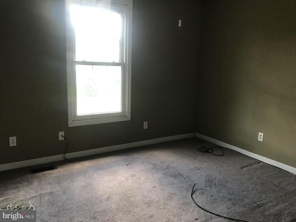 9 Leamington Road Fredericksburg, VA 22406 - Photo 11 of 12 a view of a room with window