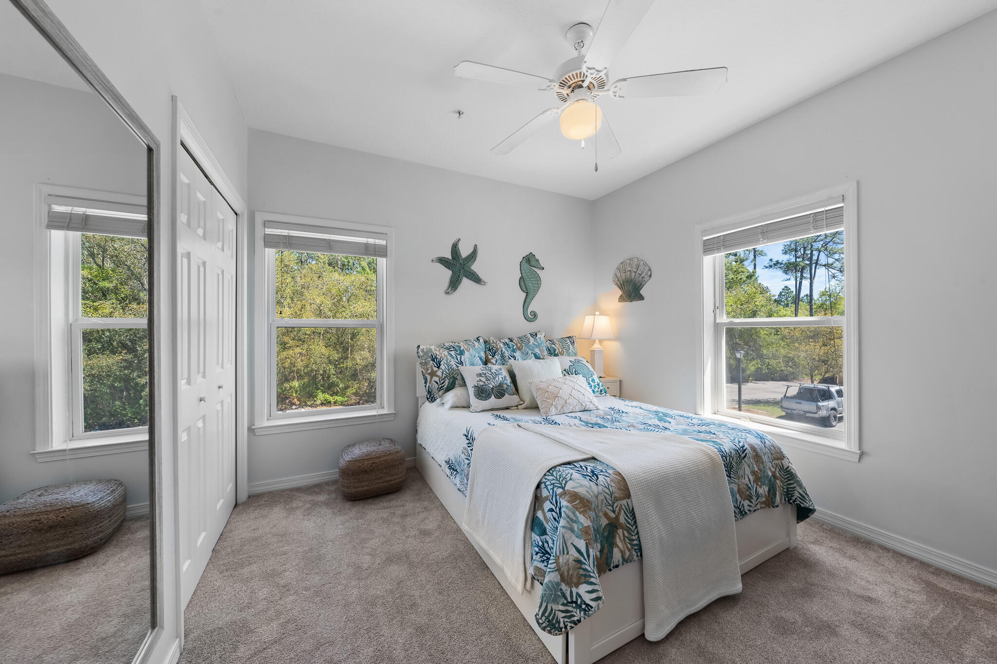 34 Heron's Watch Way, Unit 7205 Santa Rosa Beach, FL 32459 - Photo 24 of 49 a bedroom with a bed couch and window