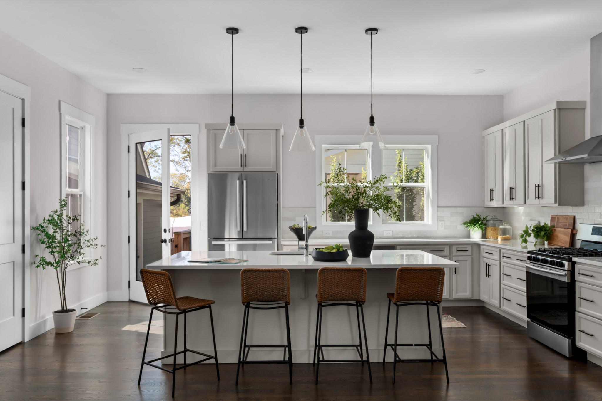 2 B Belle Forrest Avenue Nashville, TN 37206 - Photo 11 of 53 a dining room with furniture potted plants and wooden floor