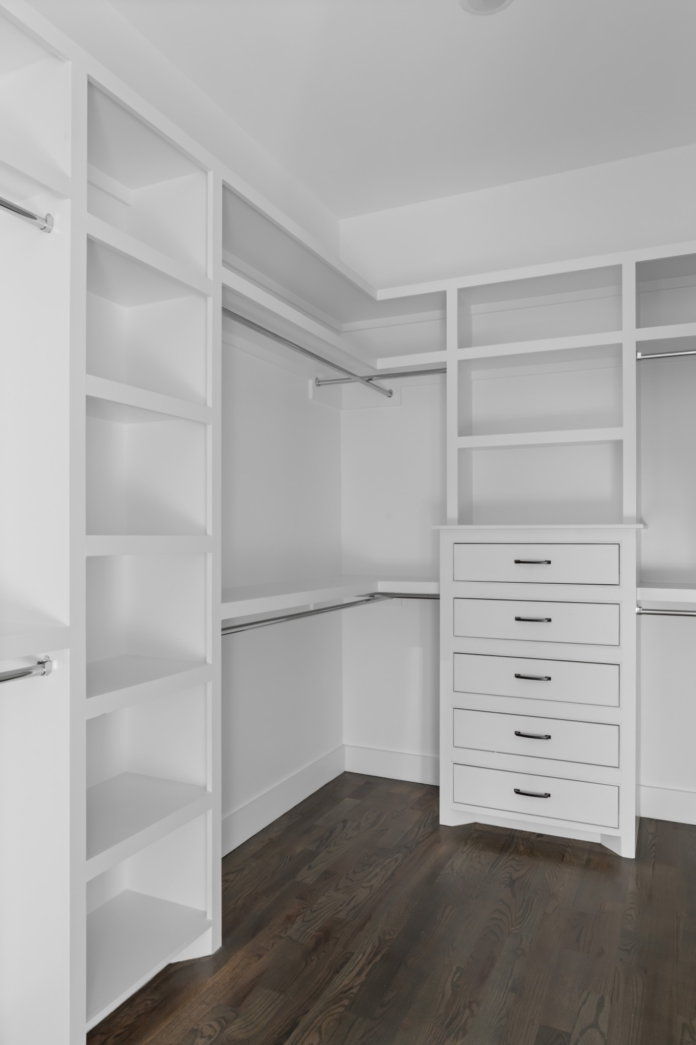 2 B Belle Forrest Avenue Nashville, TN 37206 - Photo 32 of 53 a view of walk in closet with empty racks