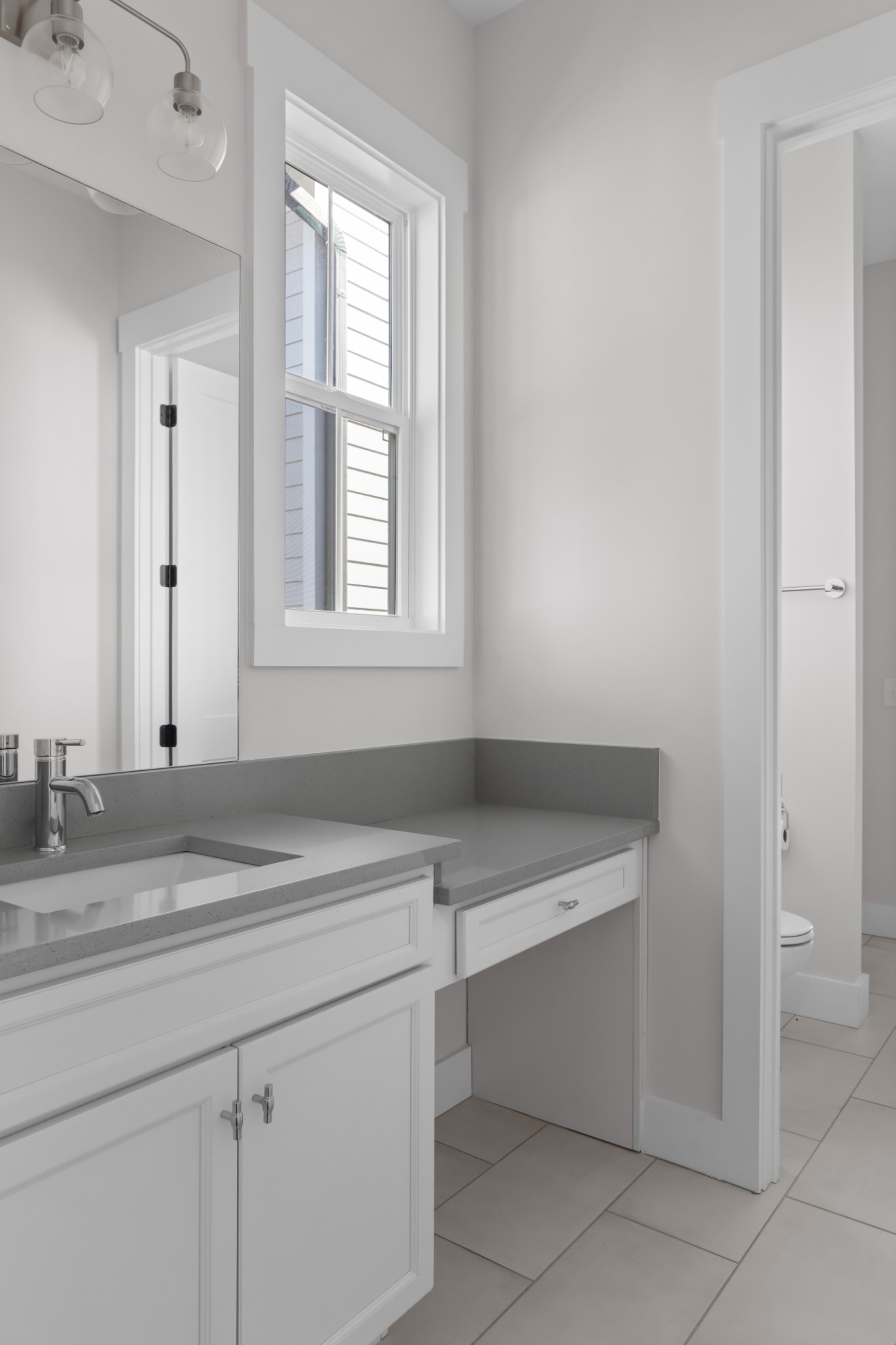 2 B Belle Forrest Avenue Nashville, TN 37206 - Photo 34 of 53 a bathroom with a sink and a mirror