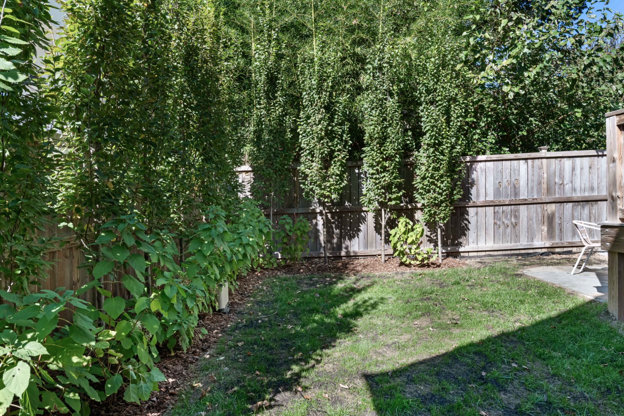 2 B Belle Forrest Avenue Nashville, TN 37206 - Photo 40 of 53 a view of a backyard with a small garden and entertaining space