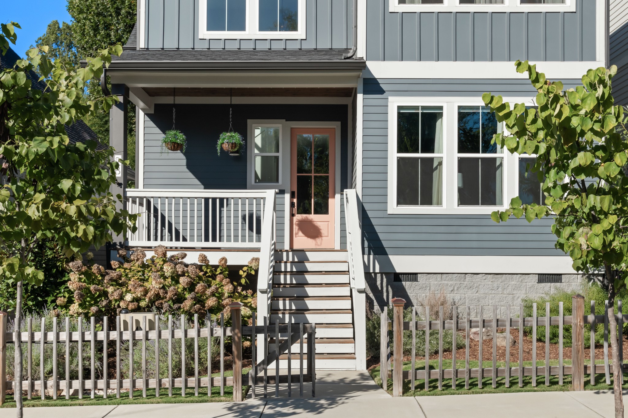 2 B Belle Forrest Avenue Nashville, TN 37206 - Photo 49 of 53 a view of a house with a small yard and wooden fence