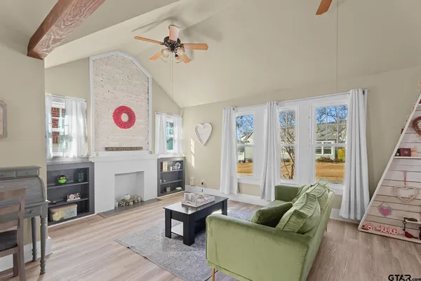 a living room with furniture and a couch