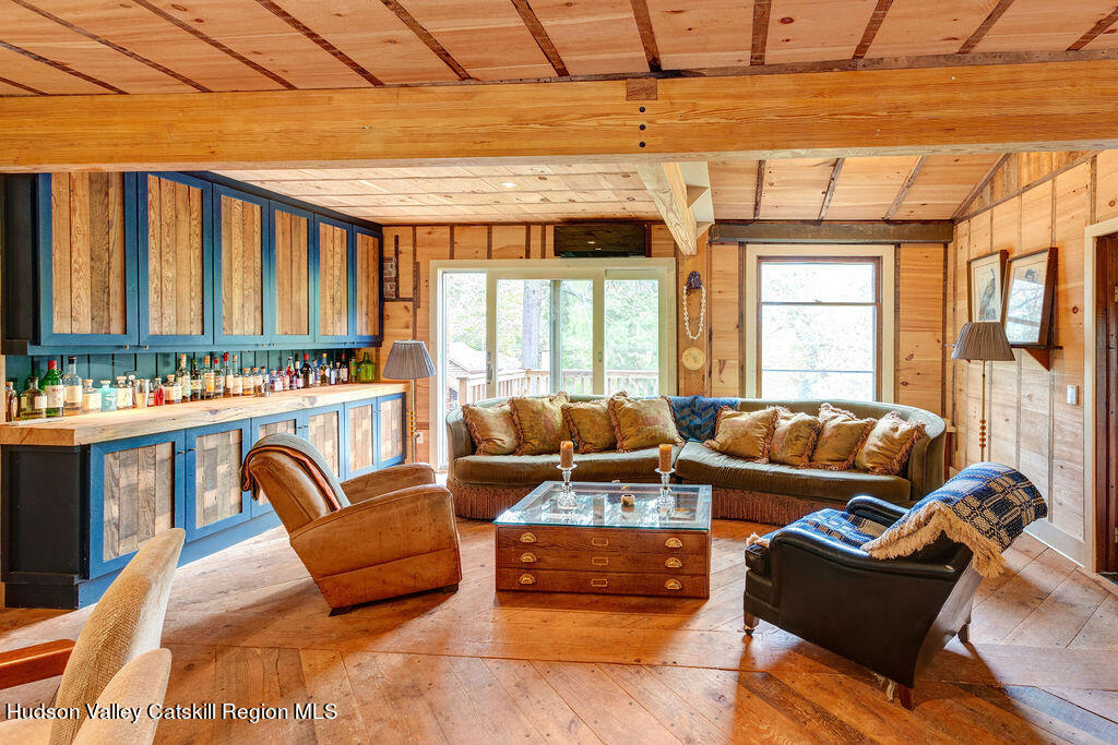 166-168 Dry Brook Road Arkville, NY 12406 - Photo 15 of 49 a living room with furniture and large windows
