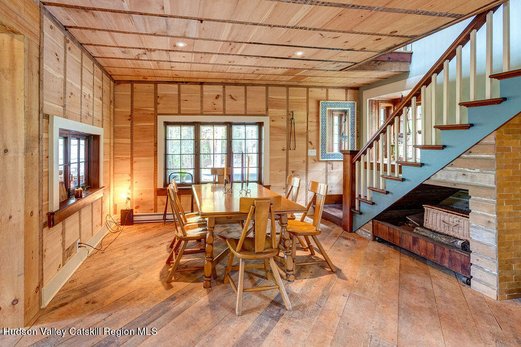 166-168 Dry Brook Road Arkville, NY 12406 - Photo 16 of 49 a dining room with wooden floor and furniture