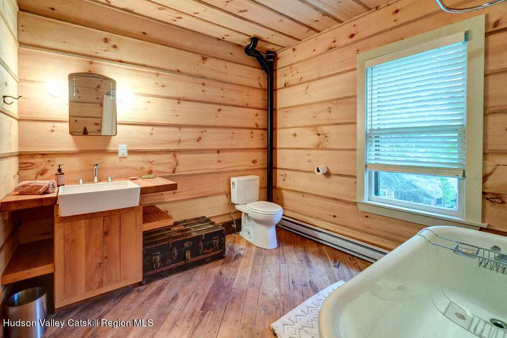 166-168 Dry Brook Road Arkville, NY 12406 - Photo 20 of 49 a bathroom with a sink and a toilet