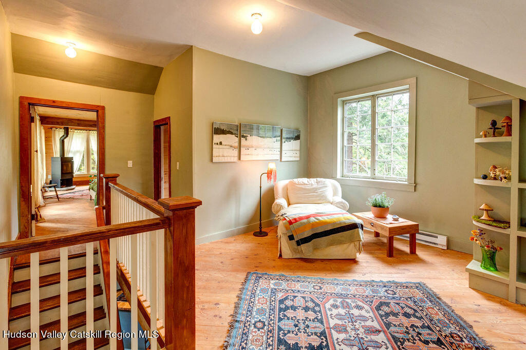 166-168 Dry Brook Road Arkville, NY 12406 - Photo 23 of 49 a bedroom with furniture and a window