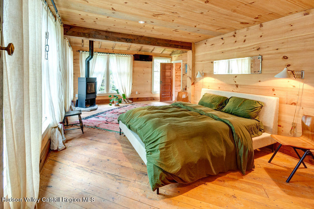 166-168 Dry Brook Road Arkville, NY 12406 - Photo 25 of 49 a bedroom with a bed and a window