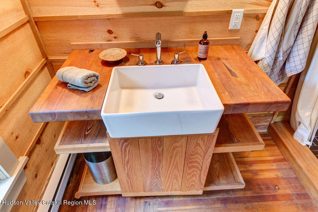 166-168 Dry Brook Road Arkville, NY 12406 - Photo 28 of 49 a bathroom with a sink and a mirror