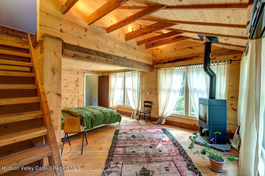 166-168 Dry Brook Road Arkville, NY 12406 - Photo 29 of 49 a living room with furniture and a window
