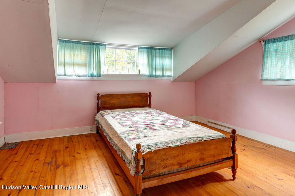 166-168 Dry Brook Road Arkville, NY 12406 - Photo 41 of 49 a bedroom with a bed and window