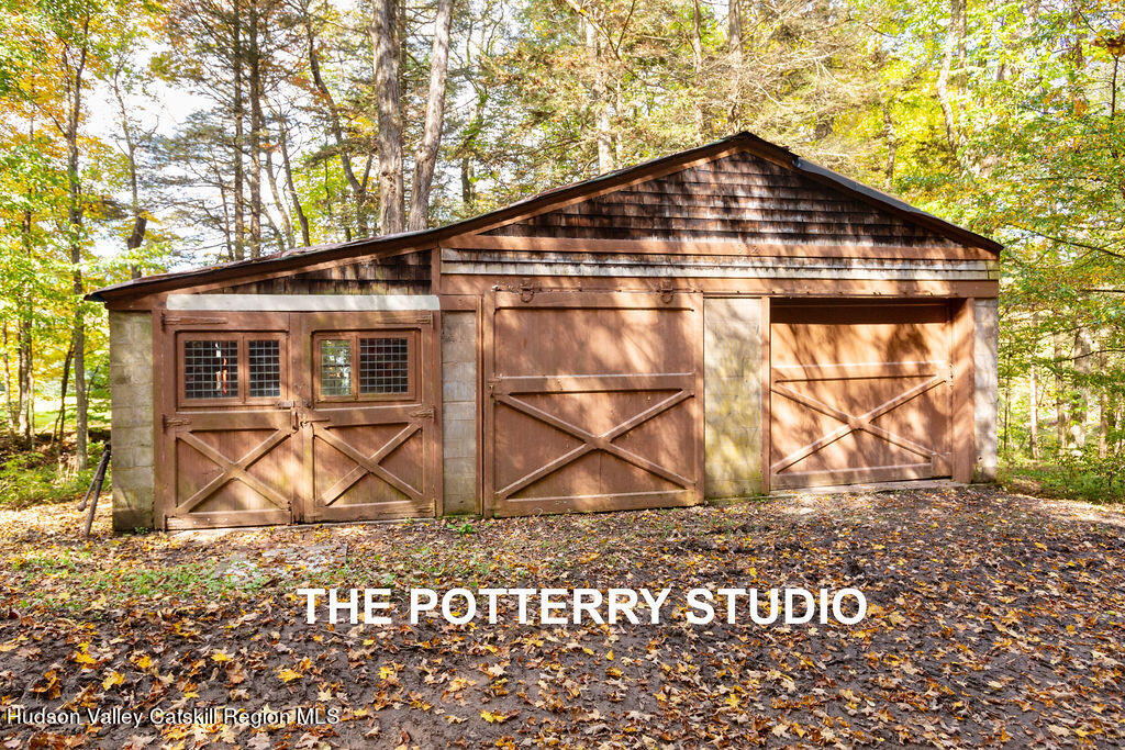166-168 Dry Brook Road Arkville, NY 12406 - Photo 46 of 49 a view of a house with a yard