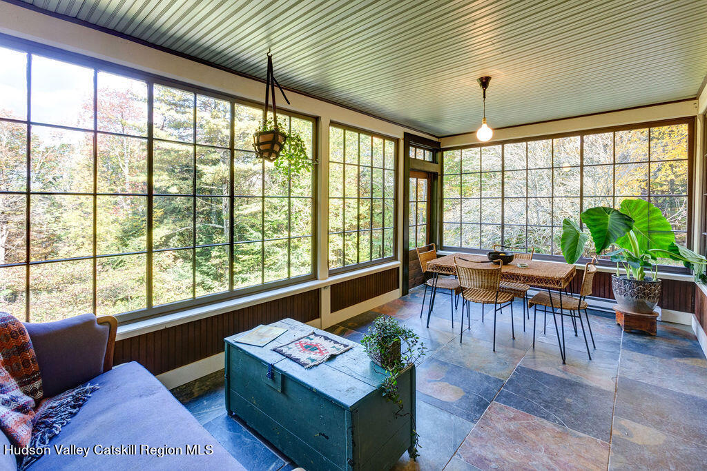 166-168 Dry Brook Road Arkville, NY 12406 - Photo 8 of 49 a living room with furniture and a large window