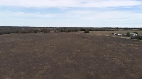 a view of an ocean and mountain