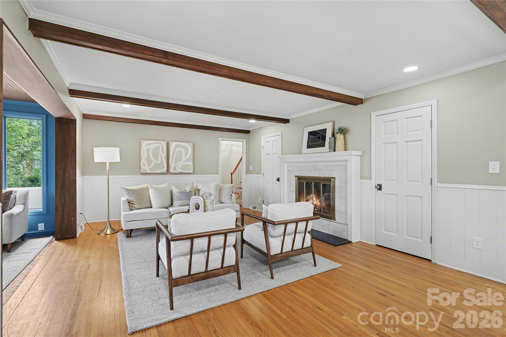 819 Ashmeade Road Charlotte, NC 28211 - Photo 14 of 42 a living room with furniture and a fireplace
