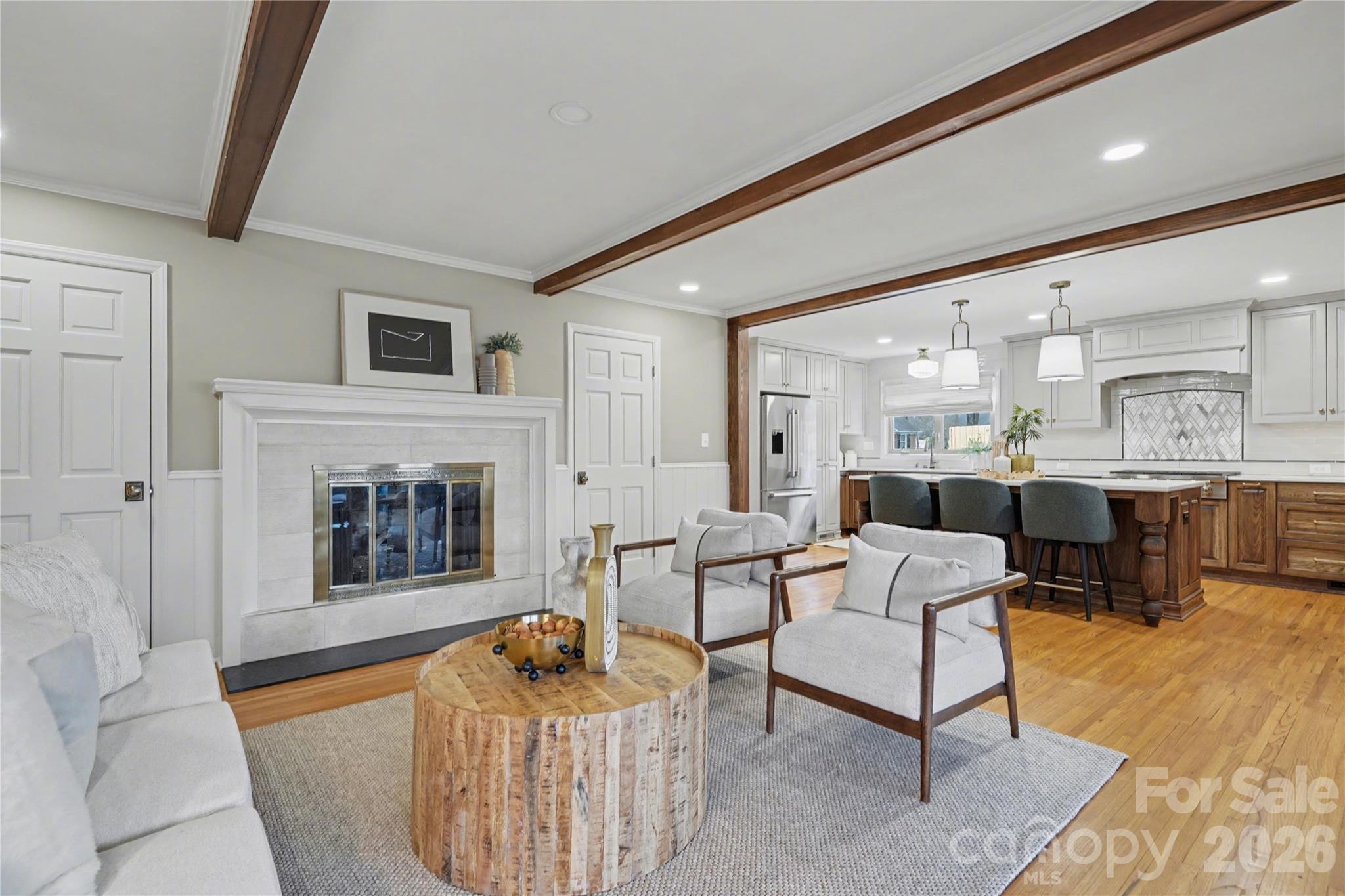 819 Ashmeade Road Charlotte, NC 28211 - Photo 17 of 42 a living room with furniture and a fireplace