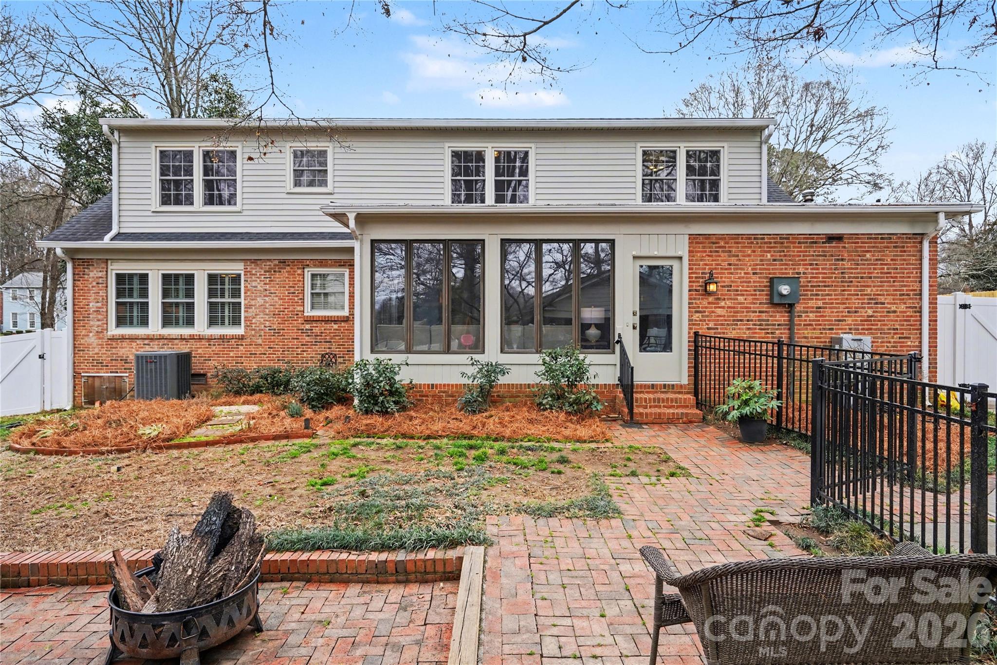 819 Ashmeade Road Charlotte, NC 28211 - Photo 32 of 42 front view of a house with a yard
