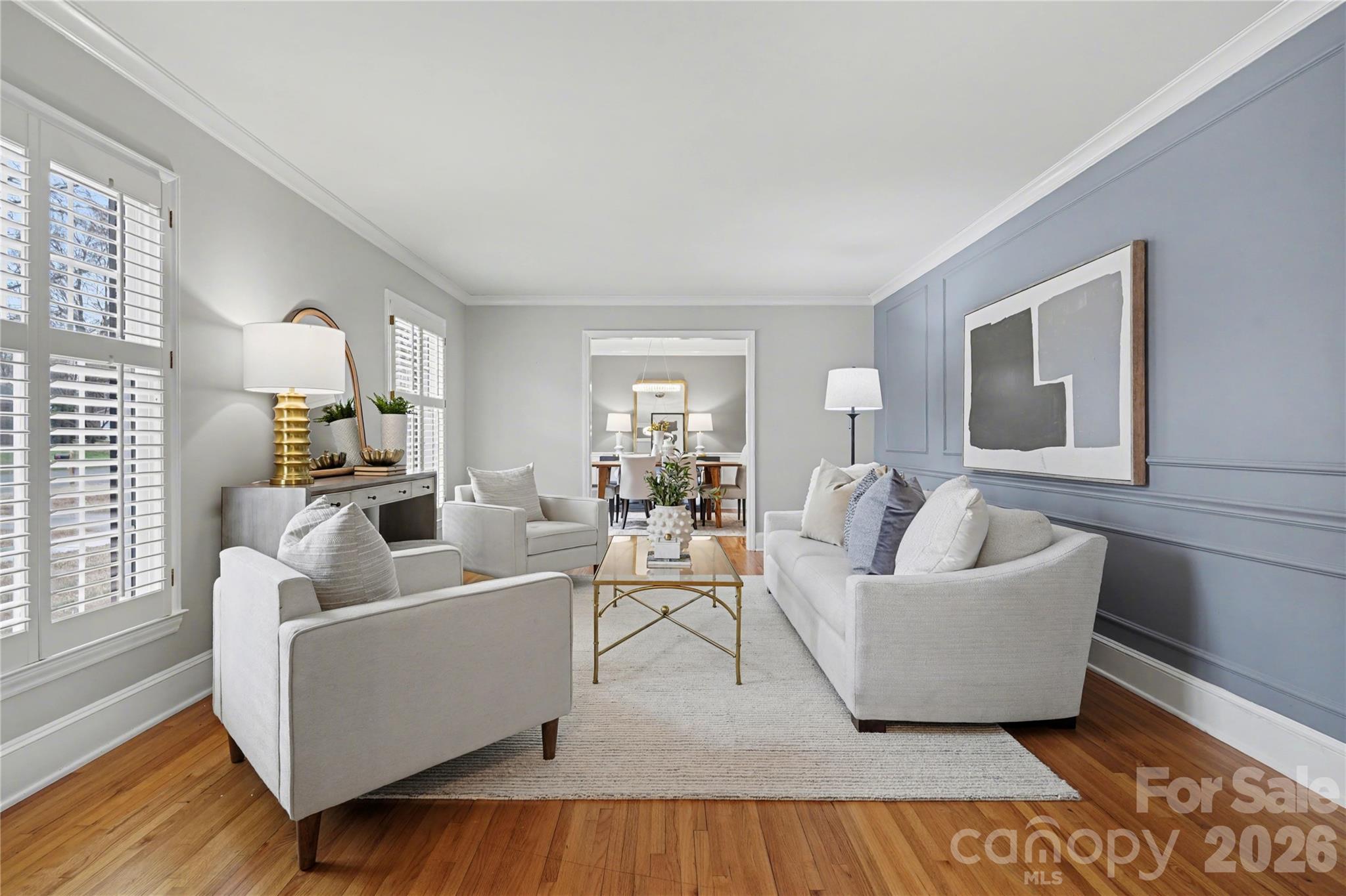 819 Ashmeade Road Charlotte, NC 28211 - Photo 4 of 42 a living room with furniture and a large window
