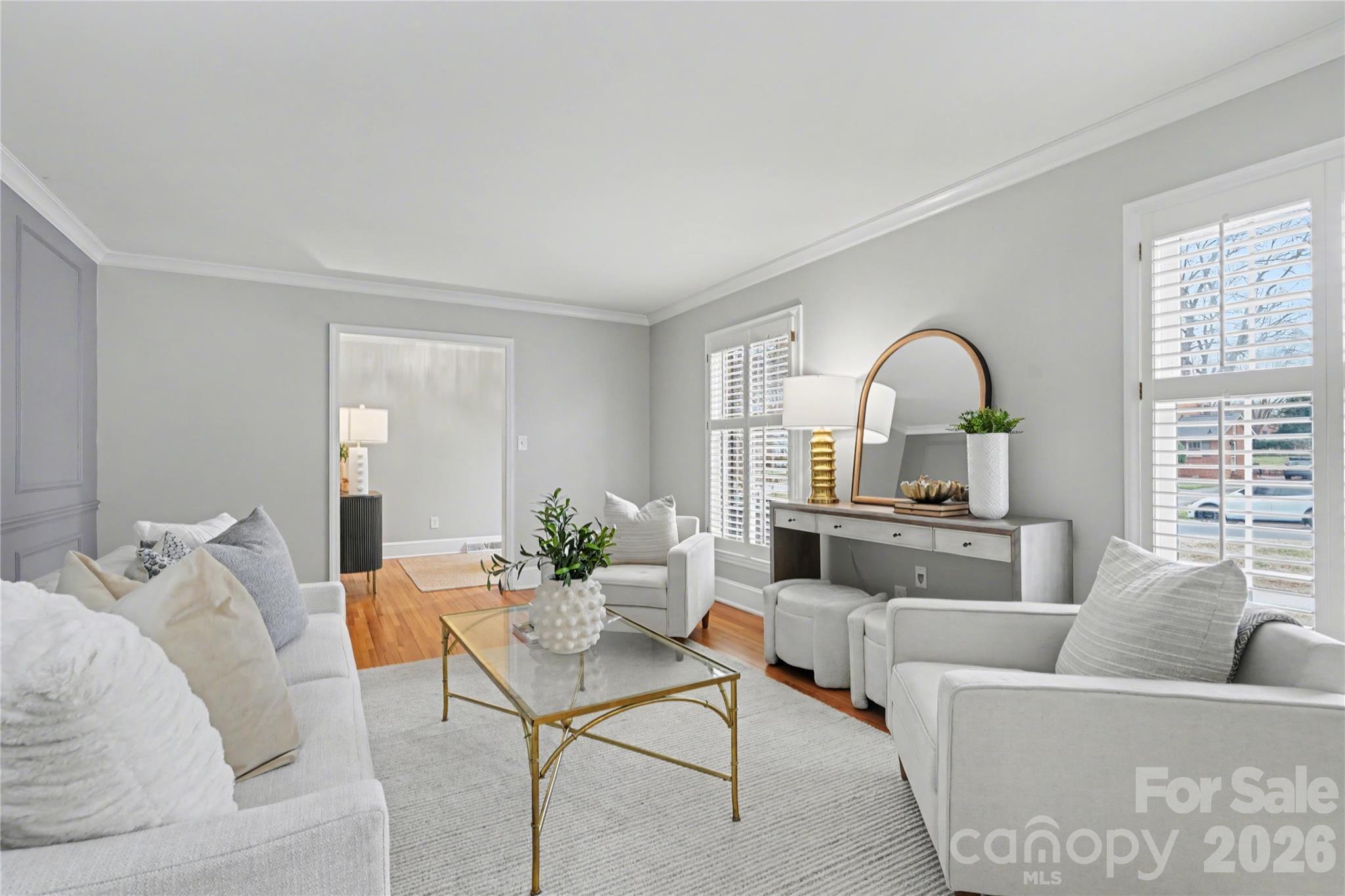 819 Ashmeade Road Charlotte, NC 28211 - Photo 5 of 42 a living room with furniture and a large window