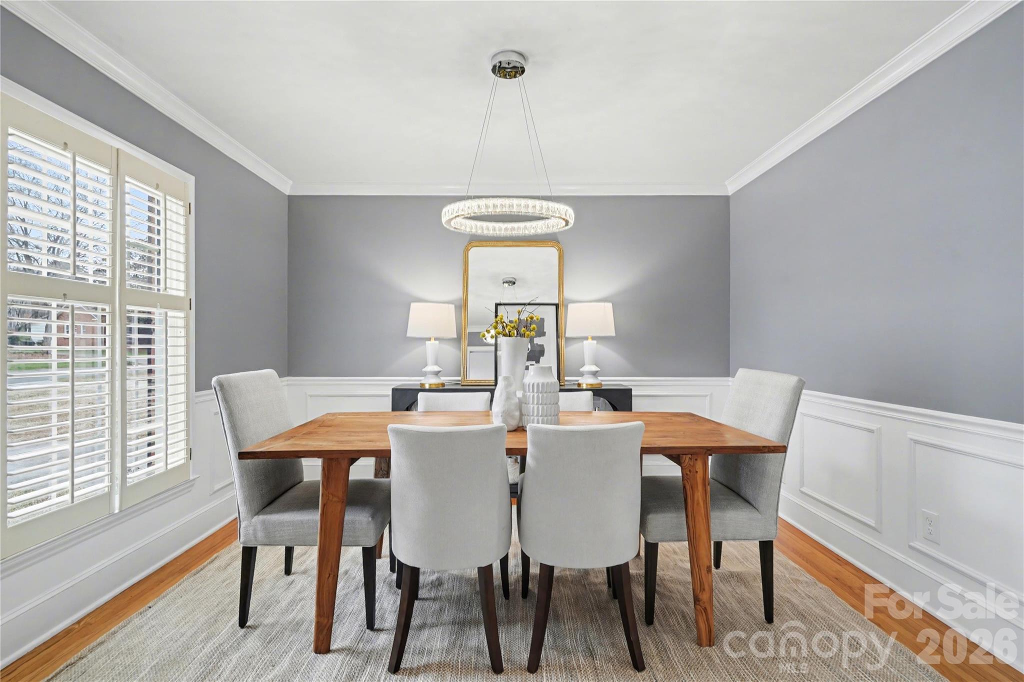 819 Ashmeade Road Charlotte, NC 28211 - Photo 7 of 42 a view of a dining room with furniture window and wooden floor