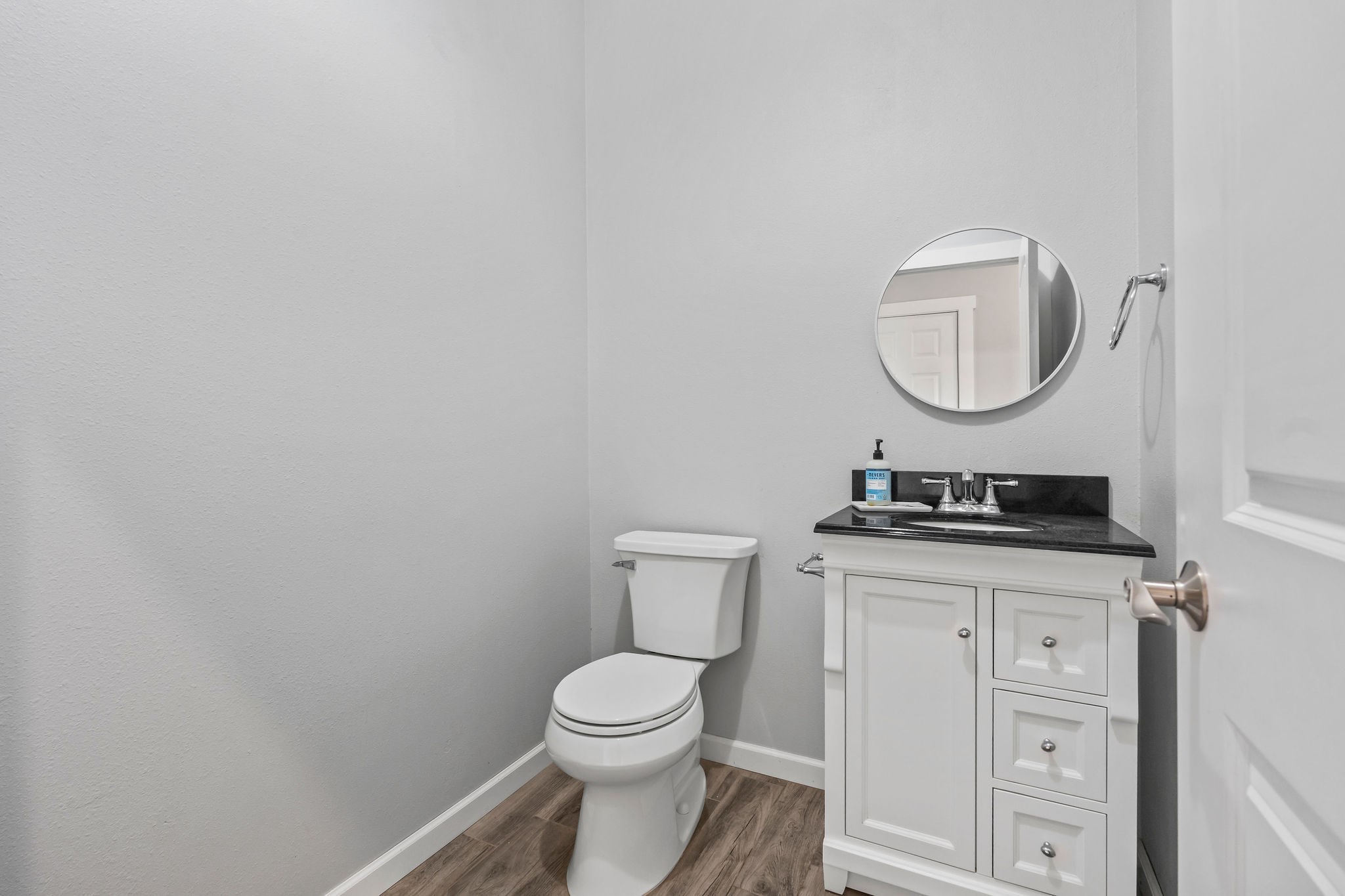 28322 Mellman Road Hempstead, TX 77445 - Photo 14 of 50 A modest half bath in the hallway.