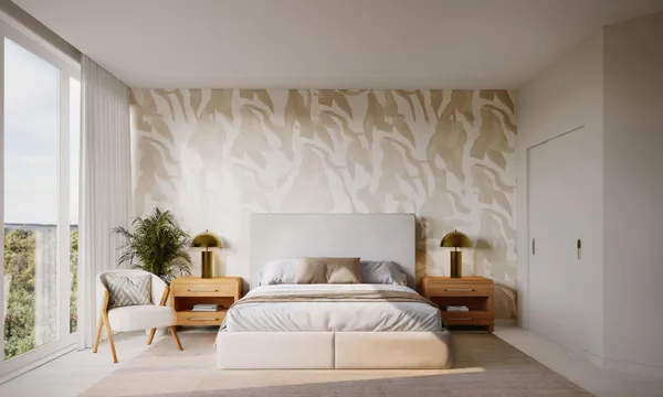 a spacious bedroom with a bed and window