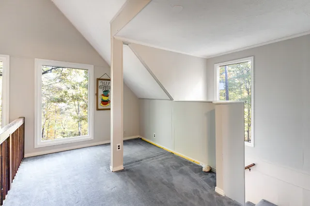 an empty room with windows