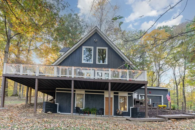 a front view of a house with parking space