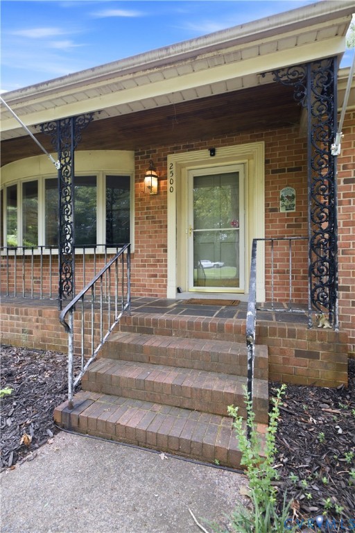 2500 Patricia Road Richmond, VA 23231 - Photo 33 of 34 Brick exterior featuring a covered front porch wit