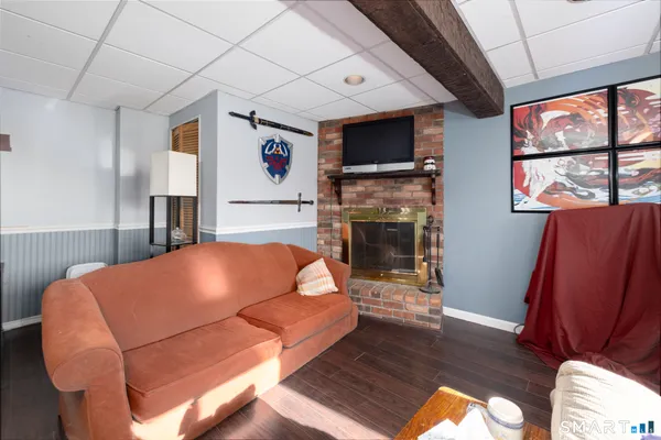 a bed room with a bed and a television